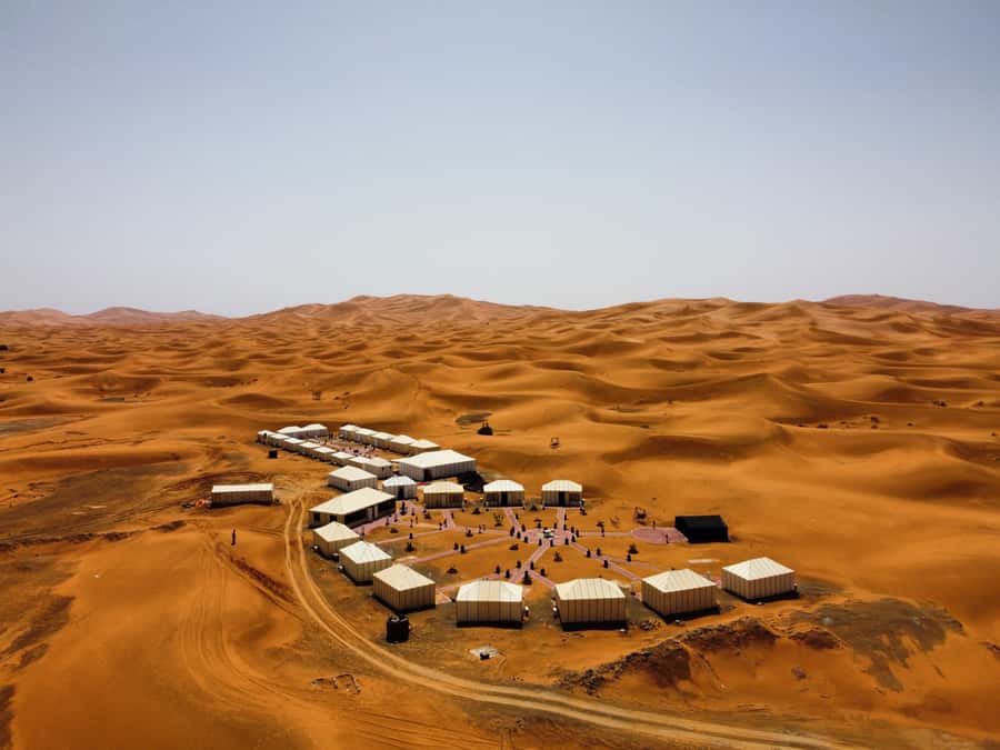 Merzouga: Overnight Stay in Luxury Desert Tent with Dinner - The sunset camel ride across Erg Chebbi