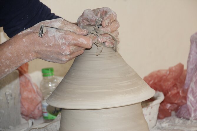 Pottery and Mosaic Workshop in Fes Led by Local Artisans - Shaping clay at the pottery wheel