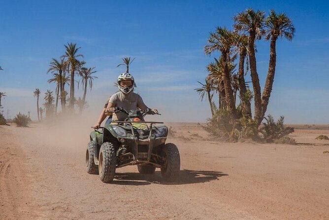 Quad bike ride palm grove Desert of Marrakech mountain bike - The Berber village tea stop