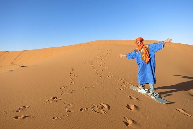 Sandboarding guided experience from Agadir&Taghazout - Sunset, camels, and unhurried time