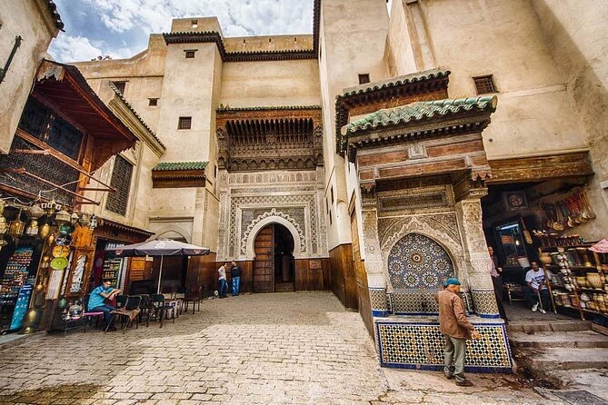 Shared Half Day Guided Fes Tour with Local Guide - Fes el-Bali, Souk el Attarine, and Moulay Idriss III