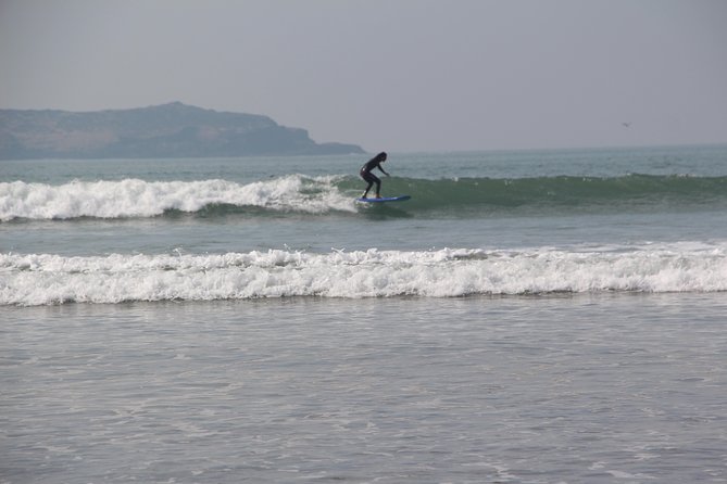 Surf Lesson with local surfer in Essaouira Morocco - Taking the board into the Atlantic