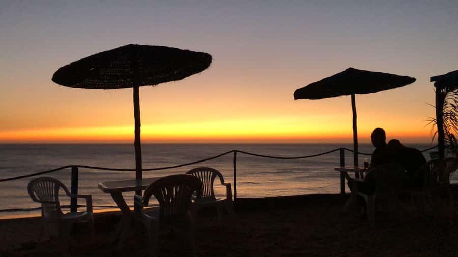 Tangier: Sunset, Tea, Sweets, Camel Ride, and Hercules Caves - Mint tea and Moroccan pastries at Bouhindiya Cafe