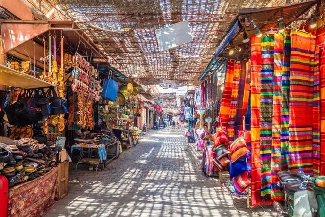 tour of marrakech-medina, souks, secret gardens,Madrassa& stories - Koutoubia Mosque and Marrakech’s famous skyline