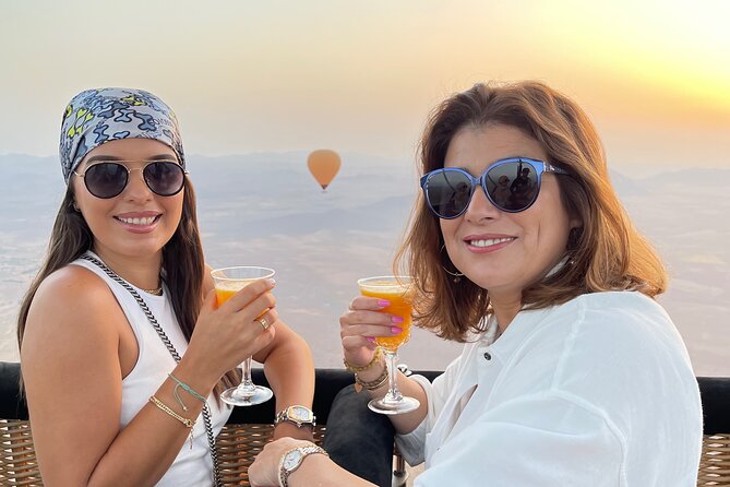 Viator Exclusive: Private Sunrise Balloon Ride with Royal Breakfast on Board - Breakfast at altitude, with a weather warning